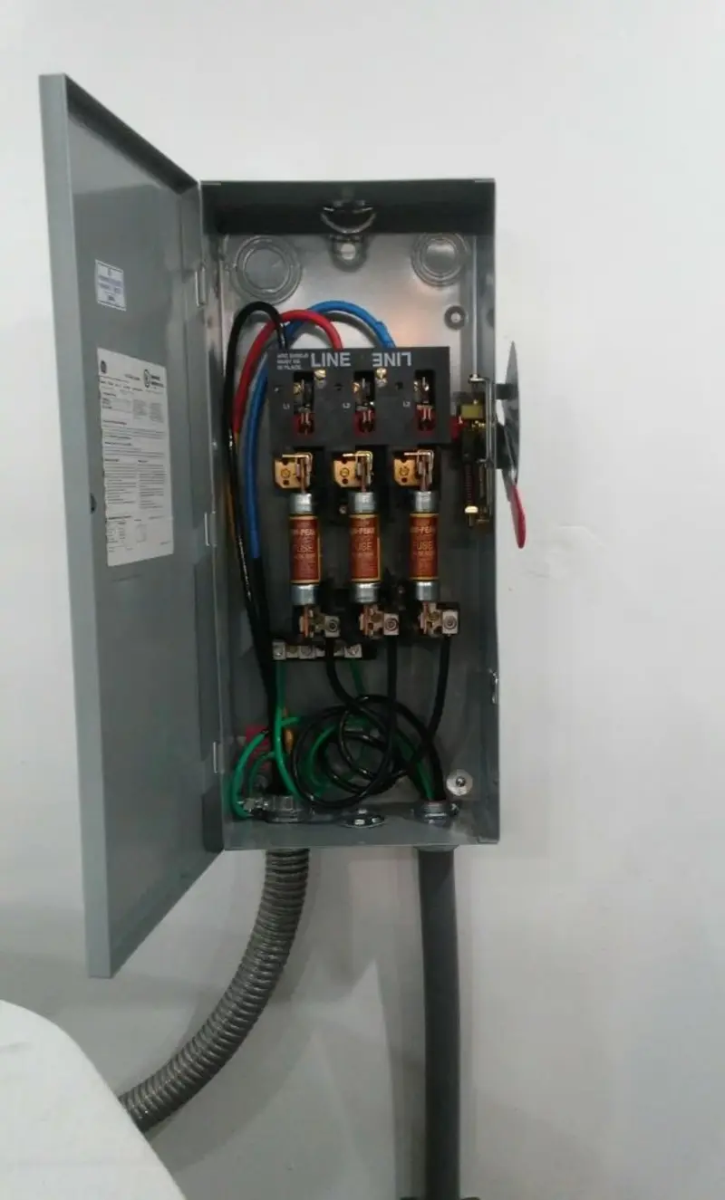 Three-phase disconnect switch installed for Smoke Detector Installation in Jones